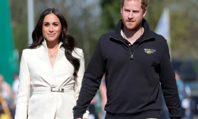 Meghan Markle may not be accompanying Harry to the UK for the Invictus Games event because she is afraid that she will be booed by the British public again, a royal expert has said.