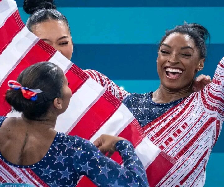 Simone Biles has become the most decorated American Olympic gymnast of all time after Biles and her teammates secured gold in the team finals at the Paris Olympics. With her eighth medal, she surpasses Shannon Miller’s seven-medal haul and she’s now tied with Anton Heida, a 1904 Olympian, for the most gold medals earned by an American gymnast.